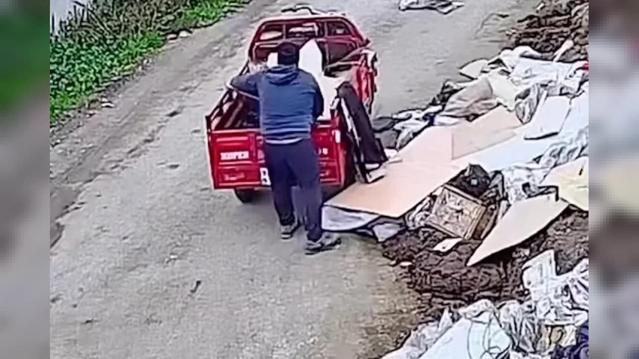 DÜZCE'DE BOŞ ARAZİYE ATIK DÖKEN KİŞİ KAMERALARA YANSIDI