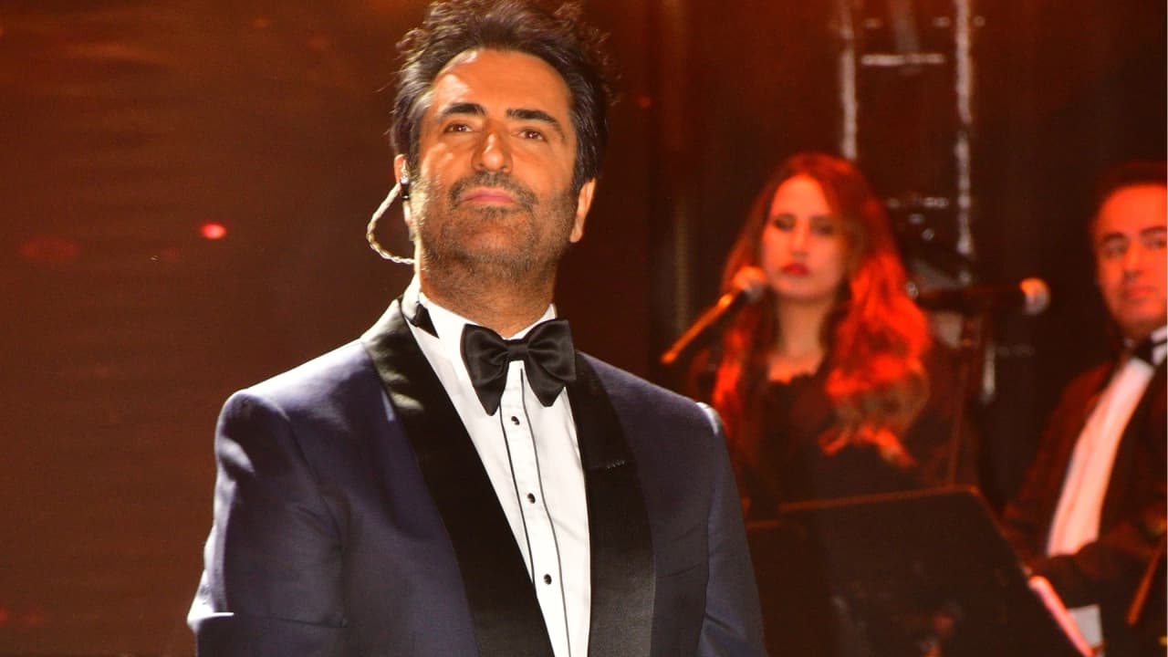 Mahsun Kırmızıgül'den Harbiye'de yağmura rağmen kalabalık şaşkınlığı